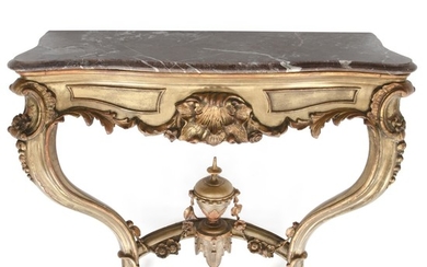 A Napoleon III giltwood and bronzed console with marble top. France, ca. 1860. H. 82 cm. W. 90 cm. D. 34 cm.