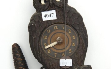 A PAICO NOVELTY 'OWL' WALL CLOCK, WITH MECHANICAL EYES, SINGLE WEIGHT AND PENDULUM, 19.5 CM HIGH