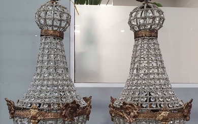 A PAIR OF BRASS AND CUT GLASS TEAR DROP CHANDELIERS