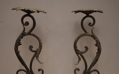 A PAIR OF DECORATIVE CANDLE HOLDERS