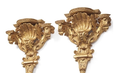 A PAIR OF FRENCH RÉGENCE STYLE GILTWOOD BRACKETS