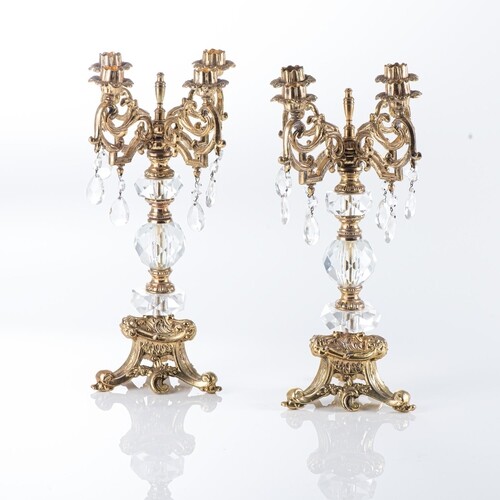 A PAIR OF GILT METAL AND CRYSTAL CANDELABRA