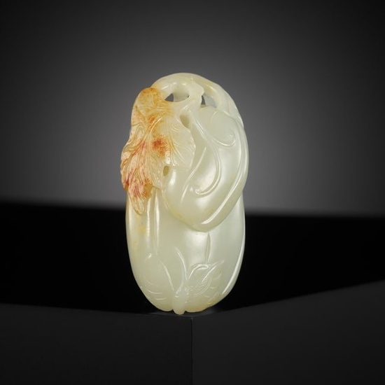 A PALE CELADON AND RUSSET JADE 'MELON AND BUTTERFLY' CARVING, 18TH CENTURY
