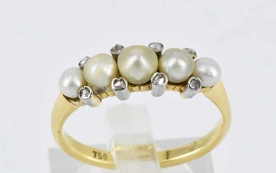 A PEARL AND DIAMOND SET RING