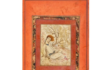 A PERSIAN MINIATURE OF A SEATED YOUTH, QAJAR 19TH CENTURY ...