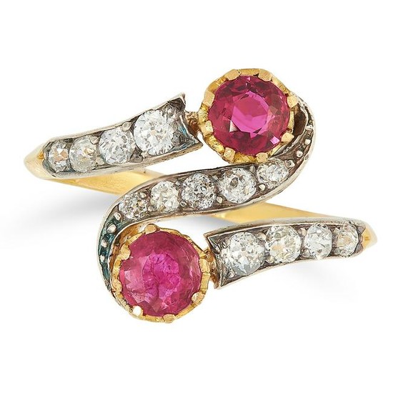 A RUBY AND DIAMOND TOI ET MOI RING set with two round