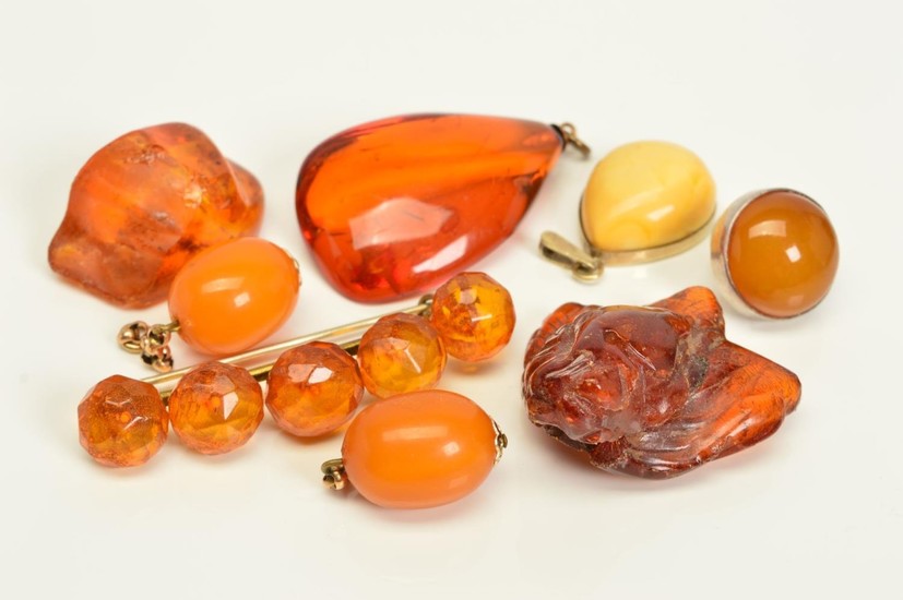 A SELECTION OF AMBER JEWELLERY, to include a pair of natural...