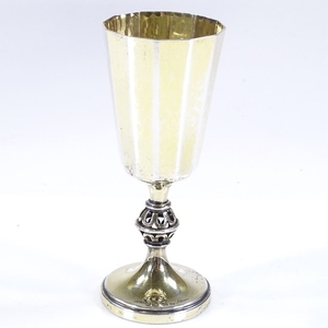 A Swedish silver-gilt goblet, with hand planished finish and...