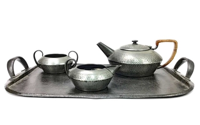 A TUDRIC PEWTER TEA SERVICE AND TRAY