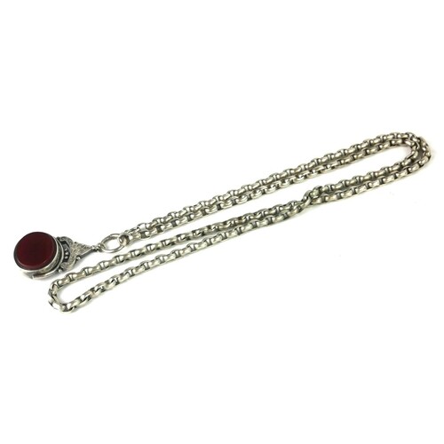 A VICTORIAN SILVER AND HARD STONE WATCH FOB The swivel set ...