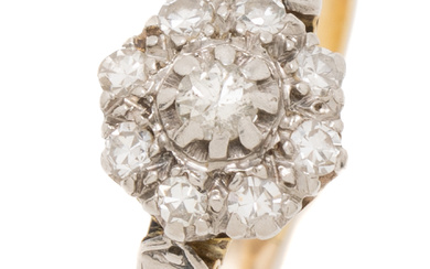 A VINTAGE 18CT GOLD DIAMOND DAISY CLUSTER RING; illusion set...