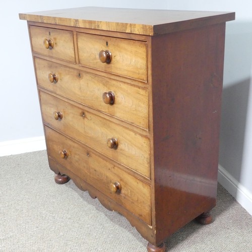A Victorian mahogany Chest of Drawers, of two short and thre...