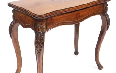A Victorian mahogany serpentine fold over card table, raised...