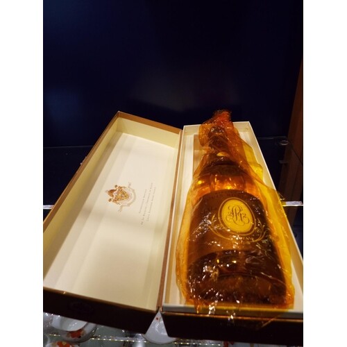 A boxed bottle of Cristal 2002 Louis Roederer champagne