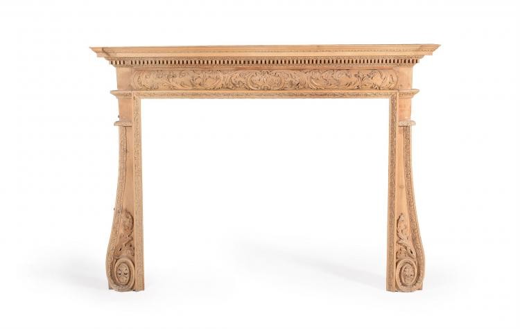 A carved pine chimney piece, in George III style, mid 19th century