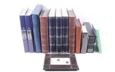 A collection of stamp albums and stock books.