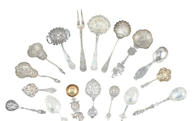 A collection of various European fancy spoons and