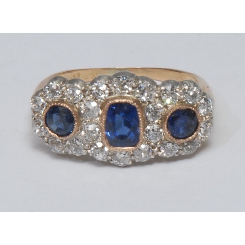 A diamond and sapphire triple crown cluster ring, three indi...
