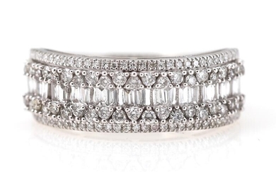 A diamond ring set with numerous baguette, brilliant and single-cut diamonds weighing...