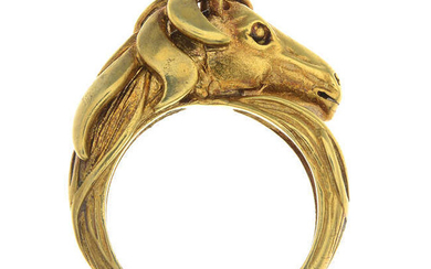 A dress ring, depicting a horse head.