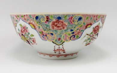 A famille rose bowl19th century, ChinaA round bowl with an elaborate border design on the...