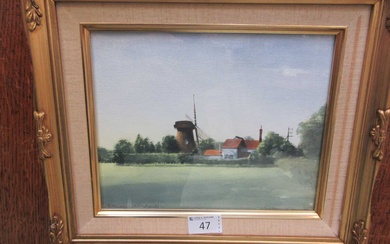 A framed and glazed watercolour of windmill scene signed bottom...