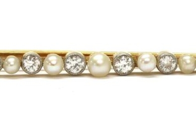 A gold diamond and pearl brooch
