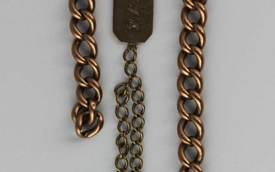 A gold hollow curb link bracelet