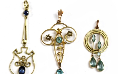 A gold sapphire and split pearl pendant