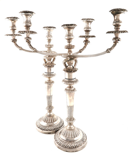 A large pair of George III silver and old Sheffield plate three-light candelabra