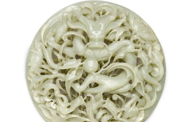 A large reticulated white jade 'dragon' plaque, Qing dynasty, Qianlong period | 清乾隆 白玉鏤雕穿蓮龍紋圓插屏