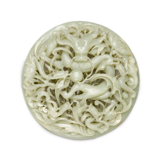 A large reticulated white jade 'dragon' plaque, Qing dynasty, Qianlong period | 清乾隆 白玉鏤雕穿蓮龍紋圓插屏