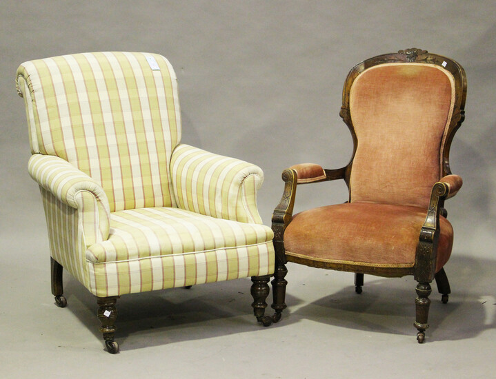 A late 19th/early 20th century scroll back armchair, on turned beech legs and castors, height 90cm