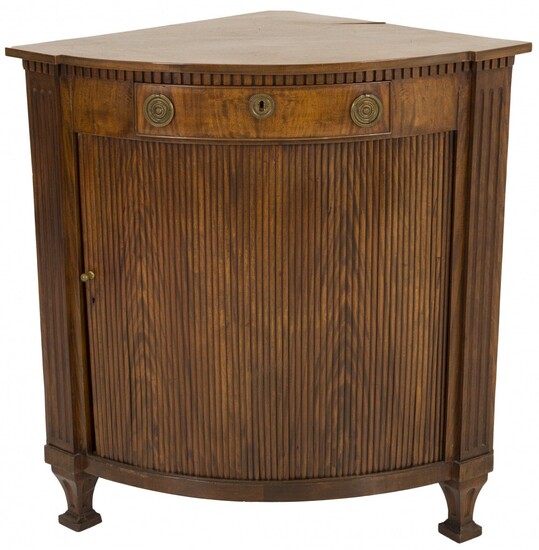 A mahogany corner cabinet, Dutch, ca. 1800.