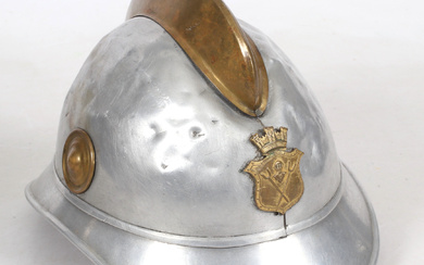 A metal fire helmet, 20th century.
