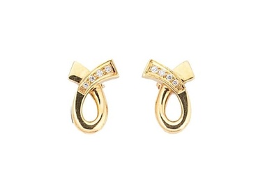 A pair of 18ct gold diamond set ear studs