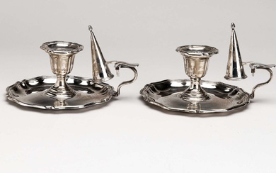 A pair of English silver chamber candlesticks with snuffers