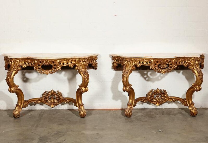 A pair of Louis XV style giltwood console tables