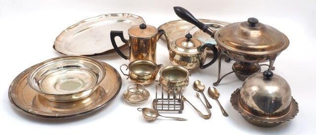 A pair of Victorian silver sugar nips, London, 1859, Chawner & Co., together with a small silver stand, 7.3cm dia,, and a small quantity of silver plate including a chafing dish and stand; several serving platters and a three piece tea set...