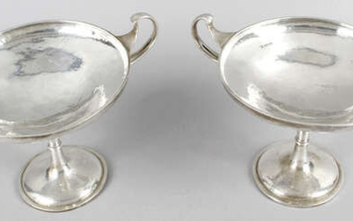 A pair of early George V silver twin-handled tazza dishes in Art Nouveau style.