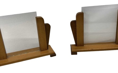A pair of light oak Art Deco style photograph frames.Condition...