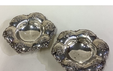 A pair of ornate American silver dishes on feet. Approx. 122...