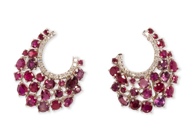 A pair of ruby, diamond and eighteen karat gold pendant earrings