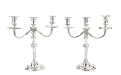 A pair of silver three light candelabra, the detachable branches...
