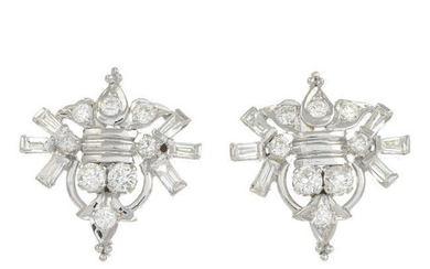A pair of vari-cut diamond geometric earrings.