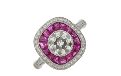 A platinum diamond and ruby cluster dress ring