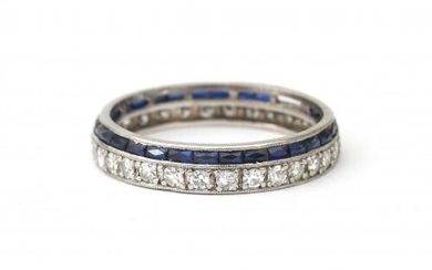 A platinum sapphire and diamond Art Deco eternity ring. Featuring French cut sapphires and thirty single cut diamonds (two sapphires are missing). 950/1000 platinum. Gross weight: 2.5 g.