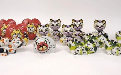A quantity of Lorna Bailey pottery cats, 20th century and later, to include cats modelled with Easter eggs, four love heart cats, and one further 'art ware' plaque, signatures to bases, tallest 14cm high (14)