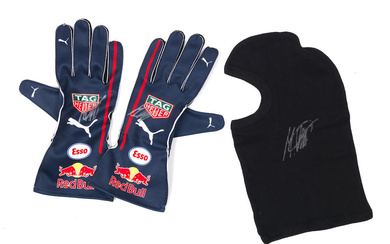 A replica pair of gloves, signed Max Verstappen