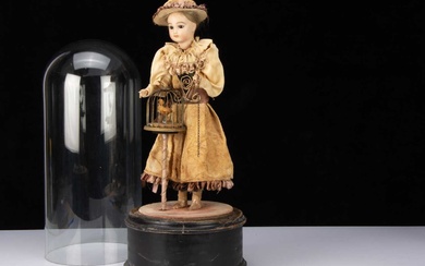 A reproduction automaton of of a girl with birdcage